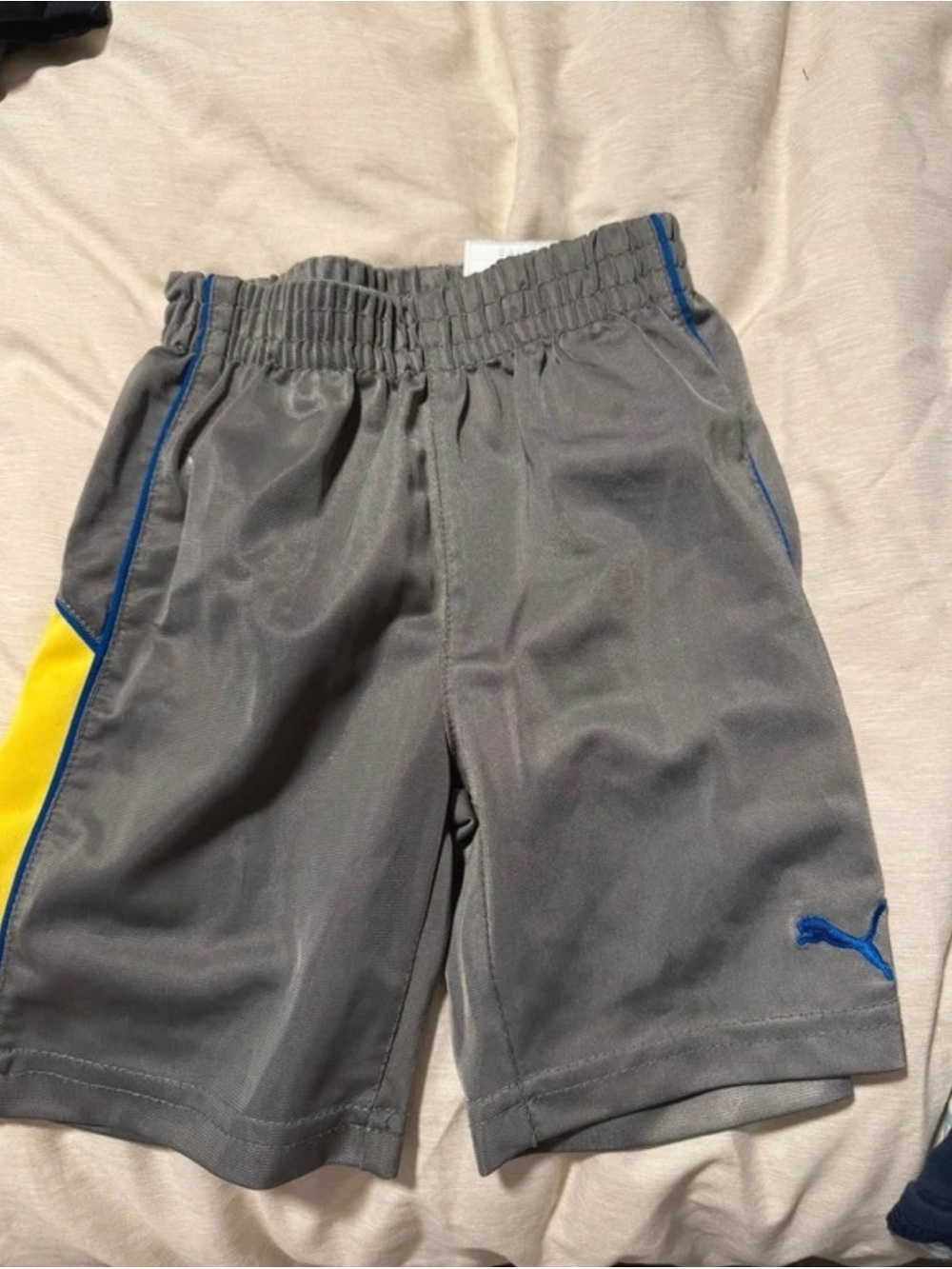 Puma Gray Kids Athletic Shorts with Blue & Yellow Accents
